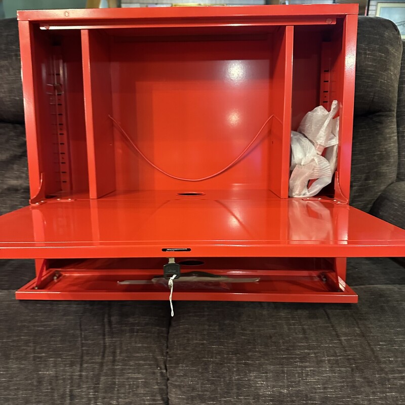 Metal Wall Workstation<br />
Size: 28 x 24<br />
Opens to 23 inches deep<br />
Can be installed anywhere!<br />
Metal drawer pops out and top door drops down.<br />
Red - new condition.<br />
Originally from Ikea