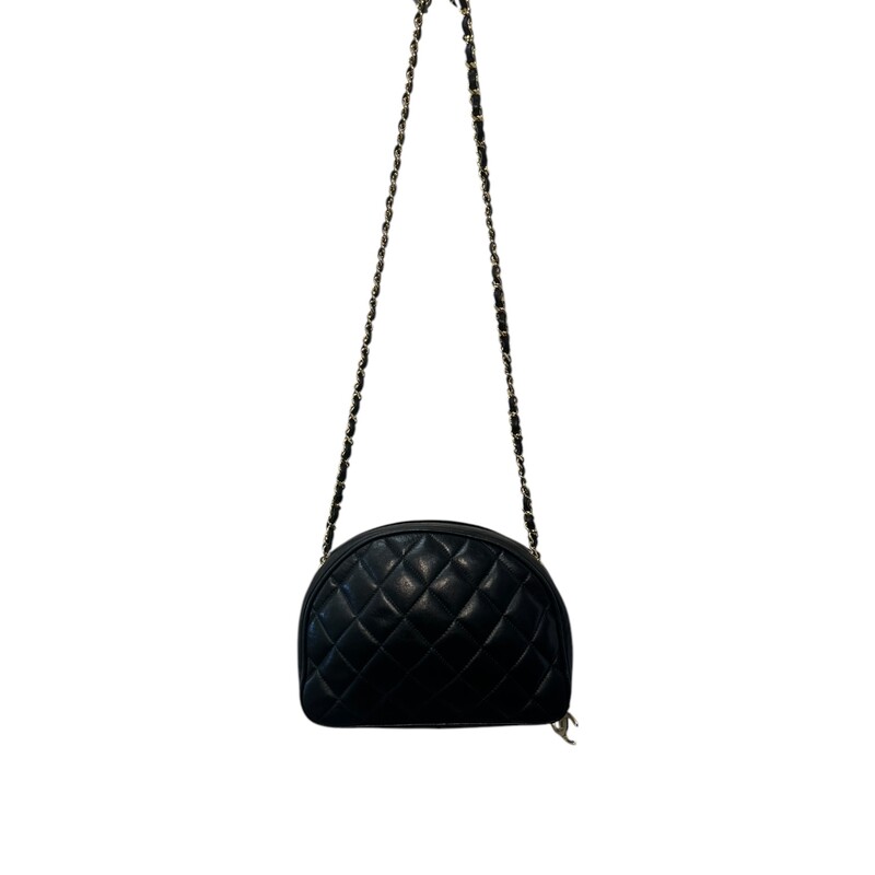 Chanel Camera Lambskin Black Handbag<br />
<br />
Entrupy Certificate provided<br />
<br />
Dimensions:<br />
9in x 6.5in x2in<br />
<br />
In very good condition. Tarnishing to the hardware. Light wear to the lambskin throughout the bag. Zipper pull on one interior pocket missing.<br />
<br />
Does not come with the original dust bag or box.