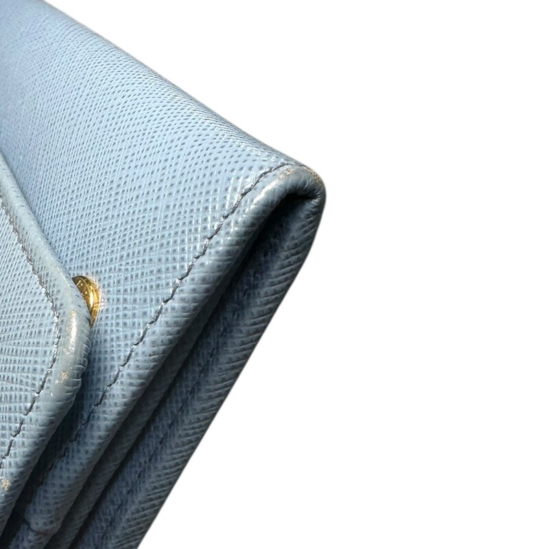 Prada Continental Wallet Light Blue Wallet<br />
<br />
Factory Code: 181<br />
<br />
Dimensions:<br />
7.5in by 3.75in by 1in<br />
<br />
In very good condition. Light wear around the corners.<br />
<br />
Does not come with the original dust bag or box.