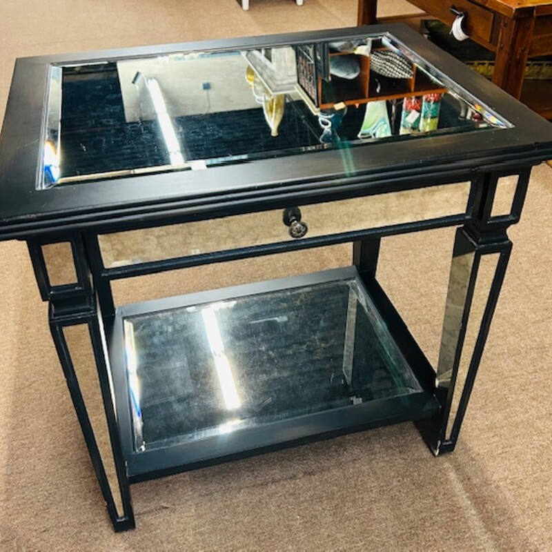 Arhaus Mirrored 1 Drawer Accent Table
Black Silver Size: 26 x 20 x 24H
As Is - some slight nicks in wood