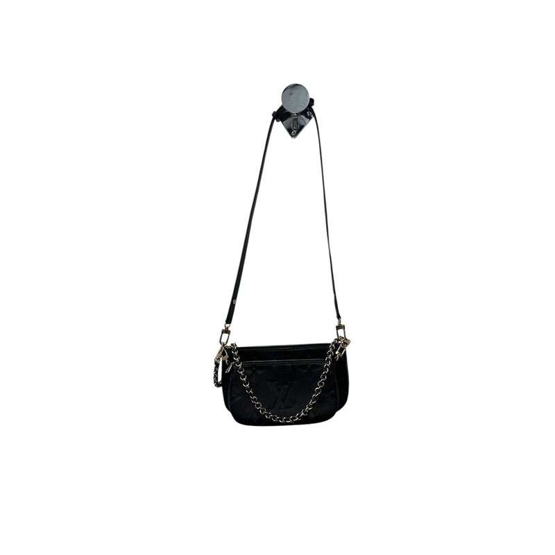 Louis Vuitton Multi Pochette Accessoires Empreinte<br />
Black<br />
<br />
Date Code: Chipped/Entrupy<br />
<br />
Dimensions:<br />
9.8 x 5.7 x 1.8 inches<br />
(Length x Height x Width)<br />
<br />
In excellent condition.<br />
<br />
Comes with original dust bag. No box.