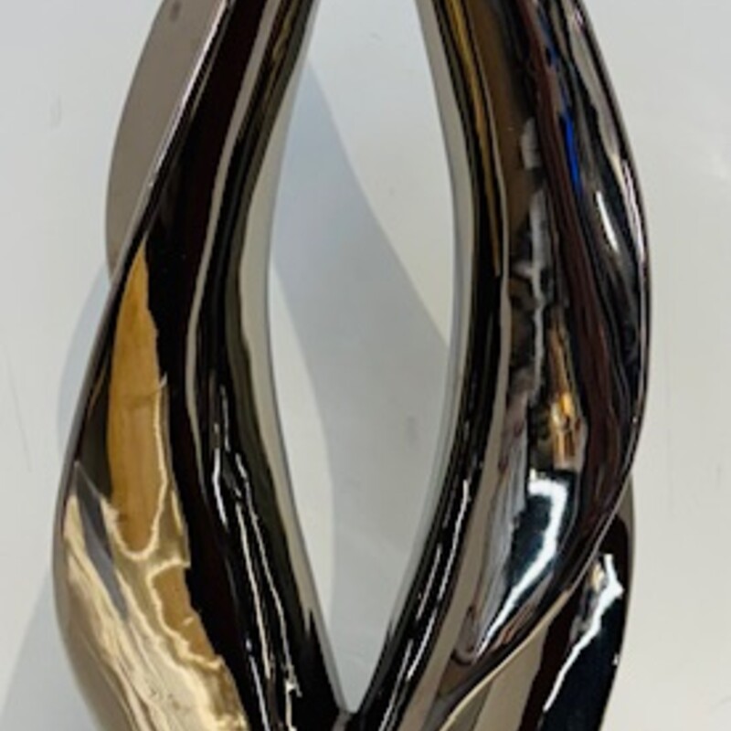 Pointed Swirl Sculpture
Silver Black
Size: 7x17H