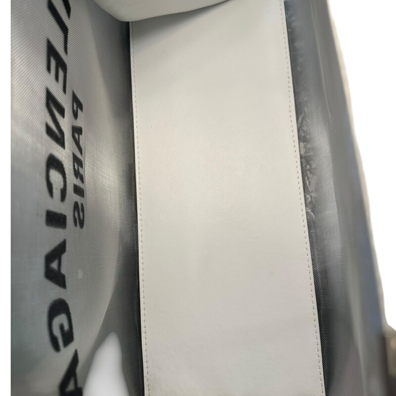 Balenciaga Duty Free White Tote<br />
<br />
Style Code:741602.9060.P.523147<br />
<br />
Dimensions:14in L x10in H<br />
<br />
Very good condition. Some wear on bottoms.<br />
<br />
Does not come with original dust bag or box.