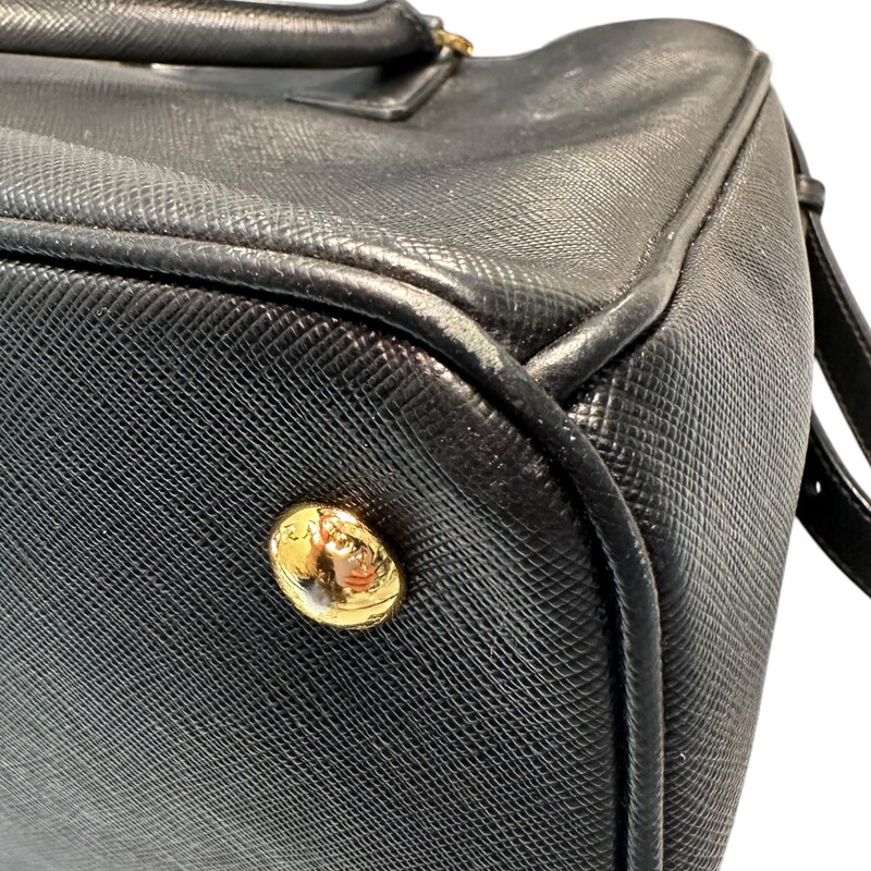 Prada Galleria Saffiano Leather Black  Bag with detachable strap.<br />
<br />
Factory Code: 8/208<br />
<br />
Dimensions:13 L x 9 H inches<br />
<br />
Very Good condition. Corner wear throughout the bag.<br />
<br />
Does not comes with original dust bag. No box.