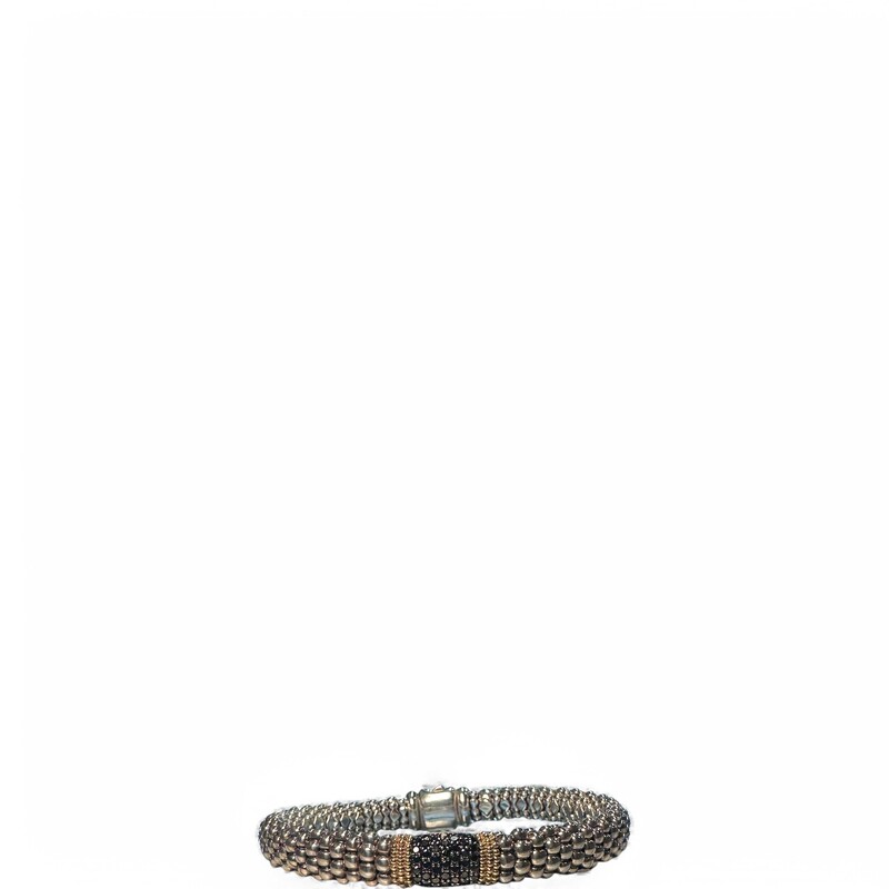 Lagos Caviar Woven Bracelet

Sterling Silver 18K Gold Black Daimond

Dimensions: 9 Length

In Excellent condition.Very minor surface scratches.

Does not come with original dust bag or box.