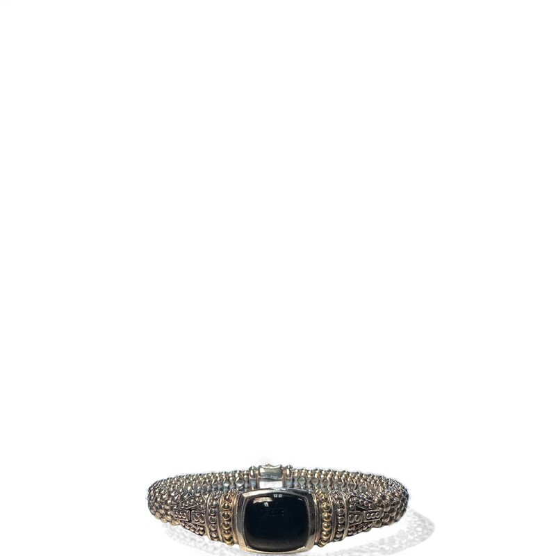 Lagos Caviar Onyx Caviar Bracelet

Sterling Silver & 18k Gold

Gemstone: Onxy Cabochon

Dimensions: 9 length

In excellent Condition. Some very minor scratches on hardware.

Does not come in with original pouch or box.