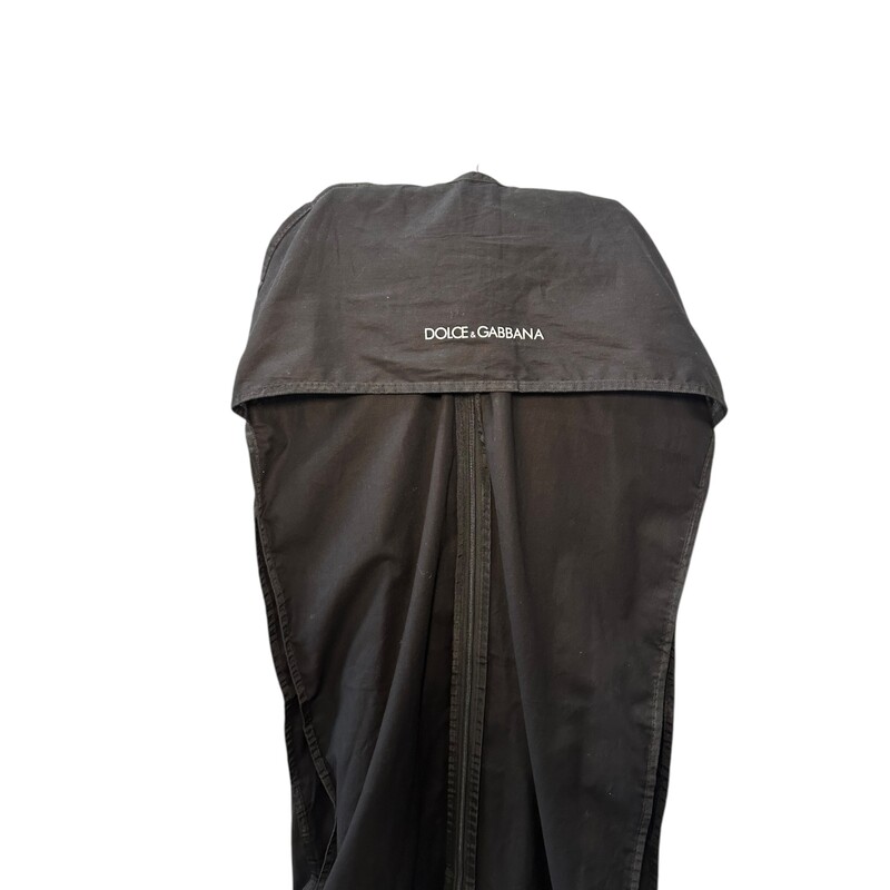 Dolce & Gabbana Woolen pants with slits on the hem<br />
<br />
Size: 40 IT/ US 26in<br />
<br />
In very good condition. Some lose string on the back by label.<br />
<br />
Comes with the garment bag.