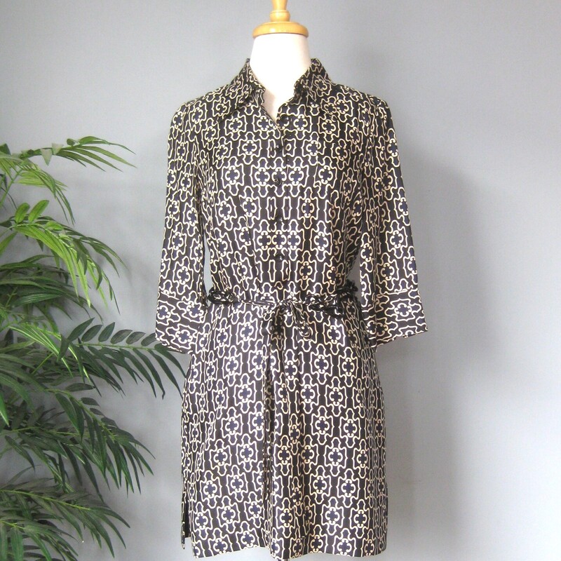 Vtg Milly Silk Twill Broc, Navy, Size: 6<br />
Classy easy to wear dress from Milly of New york<br />
100% silk<br />
A great transitional dress, the dark colors make it appropriate for fall but the light weight easy breezy cut make it great for early spring, late summer<br />
Buttons from neck to waist in the front and it also has an invisible side zipper.<br />
This dress will work for many occasions and can be worn with or without the plastic chain and sash belt<br />
It's very very dark espresso brown to black and cream with a touch of navy in the print.<br />
fully lined and made in the USA of Italian silk.<br />
3/4 length sleeves<br />
marked size 6,may fit a little smaller, pls use the measurements below to ensure it will fit you.<br />
Flat measurements:<br />
shoulder to shoulder: 14.5  this is a bit narrower than average.<br />
ampit to armpit: 18.5<br />
waist area: 18<br />
hip: 20.5<br />
length: 34.5<br />
underarm sleeve length: 11<br />
<br />
excellent pre-owned condition, no flaws.<br />
thanks for looking!<br />
#80807