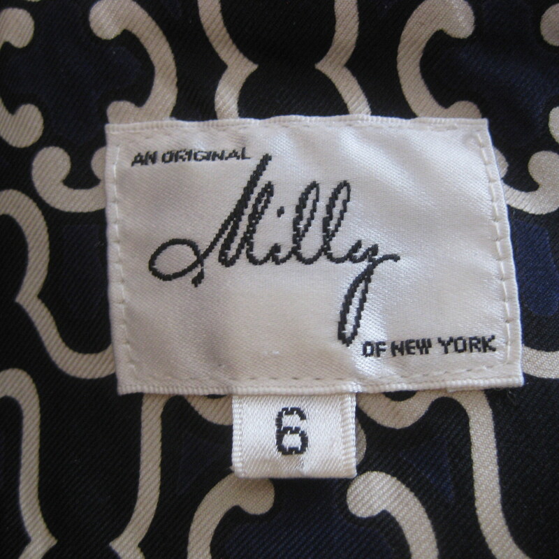 Vtg Milly Silk Twill Broc, Navy, Size: 6<br />
Classy easy to wear dress from Milly of New york<br />
100% silk<br />
A great transitional dress, the dark colors make it appropriate for fall but the light weight easy breezy cut make it great for early spring, late summer<br />
Buttons from neck to waist in the front and it also has an invisible side zipper.<br />
This dress will work for many occasions and can be worn with or without the plastic chain and sash belt<br />
It's very very dark espresso brown to black and cream with a touch of navy in the print.<br />
fully lined and made in the USA of Italian silk.<br />
3/4 length sleeves<br />
marked size 6,may fit a little smaller, pls use the measurements below to ensure it will fit you.<br />
Flat measurements:<br />
shoulder to shoulder: 14.5  this is a bit narrower than average.<br />
ampit to armpit: 18.5<br />
waist area: 18<br />
hip: 20.5<br />
length: 34.5<br />
underarm sleeve length: 11<br />
<br />
excellent pre-owned condition, no flaws.<br />
thanks for looking!<br />
#80807