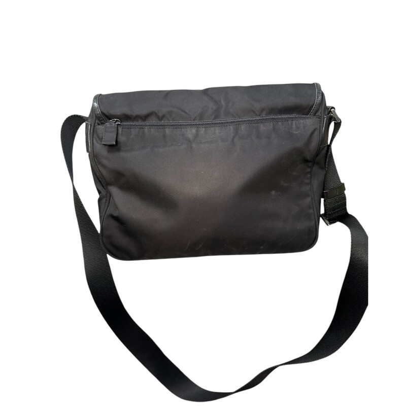 Prada Messanger Double Buckle Black<br />
<br />
Factory Code: 110<br />
<br />
Dimensions:<br />
Width 11.5in<br />
Height 9.25in<br />
Depth 3.5in<br />
Shoulder Drop 23.25in<br />
<br />
In good condition. Wear to the leather trim of the handbag.<br />
<br />
Comes with original dust bag. No box.