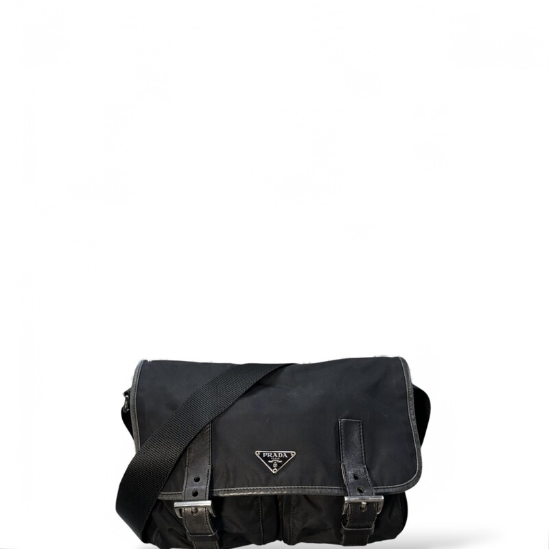 Prada Messanger Double Buckle Black

Factory Code: 110

Dimensions:
Width 11.5in
Height 9.25in
Depth 3.5in
Shoulder Drop 23.25in

In good condition. Wear to the leather trim of the handbag.

Comes with original dust bag. No box.