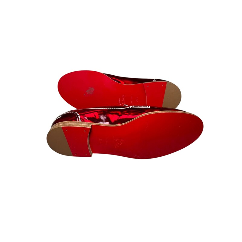 Louboutin Mocalaureat Patent Red Loafer<br />
<br />
Size: 38.5<br />
<br />
In excellent condition. Light creasing to the toes. and light scufing to bottoms.<br />
<br />
Does not come with original dust bag or box.