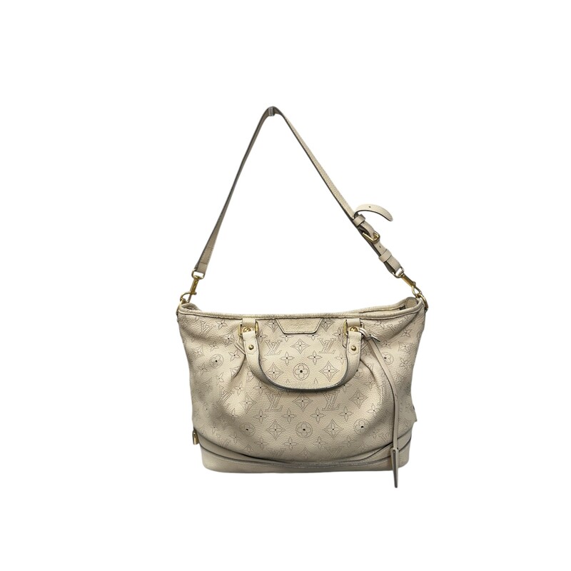 Louis Vuitton Mahina Stella PM Cream<br />
<br />
Date Code: AR4130<br />
<br />
Dimensions:<br />
Base length: 13 in<br />
Width: 6 in<br />
Height: 11 in<br />
Drop: 4.5 in<br />
Drop: 14 in<br />
<br />
In very good condition. Light wear to the top of the leather. Light staining on the interior.<br />
<br />
Does not come with the original dust bag or box.