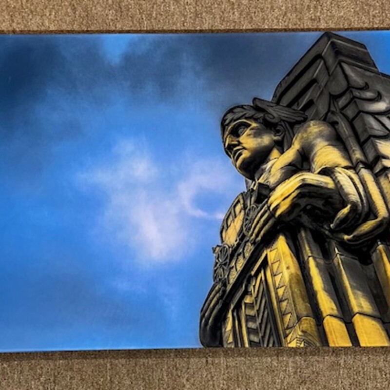 Metal Cle Guardian Statue
Blue and Yellow
 Size: 30x20H
Local Cleveland Artist