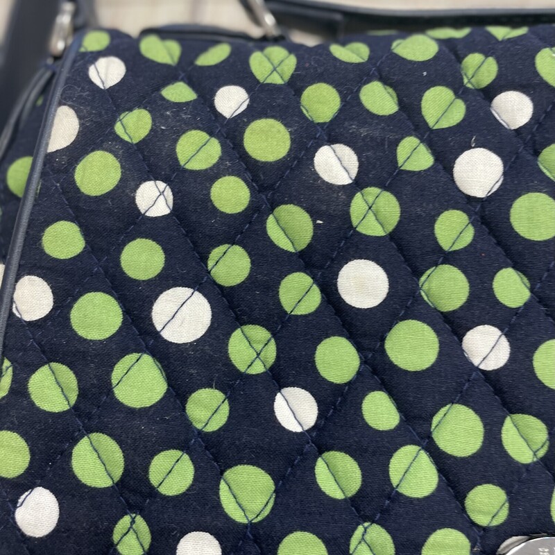 Vera bradley purse/crossbody navy with green white dots. This has a handle on the top also that can be used. Many pockets and compartments to be used.