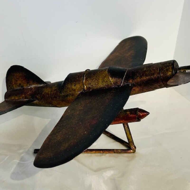 Metal Airplane Sculpture
Gold Brown Size: 17 x 17 x 8.5H