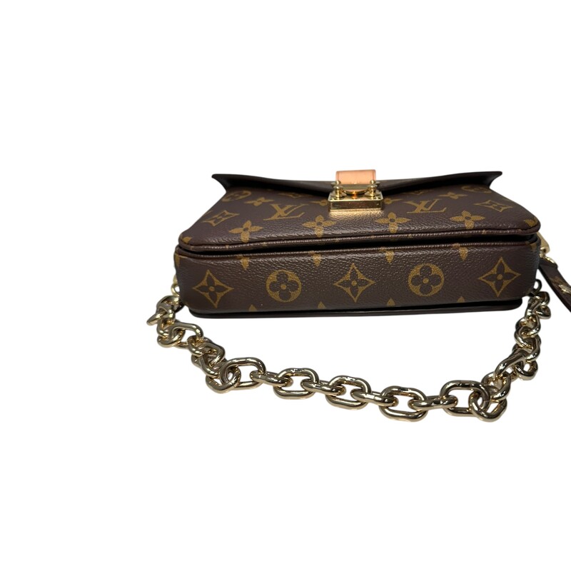 Louis Vuitton Metis East West Chain Crossbody<br />
<br />
Date Code: Microchip Entrupy Certificate Provided.<br />
<br />
Dimensions: 8.5 L x 5.3 H  x 2.4 W  inches<br />
<br />
In very good condition. Some scratching on the hardware.<br />
<br />
Does not come with original dust bag or box.