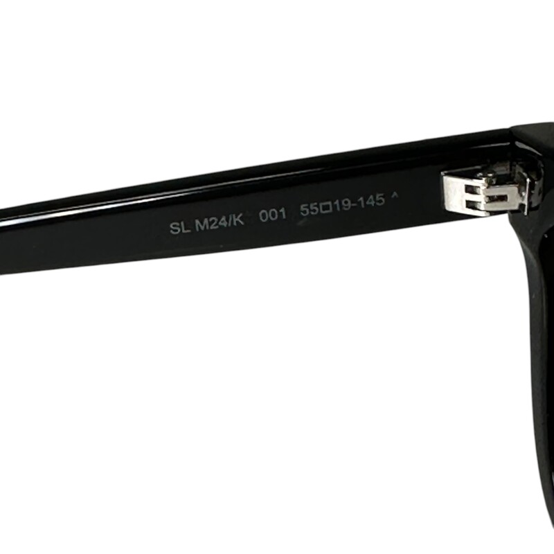 YSL SLM24/K Black Sunglasses<br />
<br />
In good condition. Major scratch on lower interior right lens.<br />
<br />
Does not come with the original case or box.