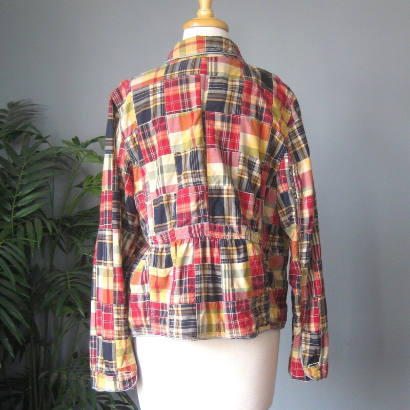 Nicely made cotton madras patchwork jacket from LL Bean. 100% Cotton made in India<br />
Hip pockets<br />
Marked size 16 petite, but no no no.<br />
Fits me generously, I am a size 10 , good for a modern size medium or maybe large, pls use measurements below to be sure it will fit YOU the way you like<br />
Unlined<br />
LIke new condition<br />
<br />
Flat Measurements:<br />
Shoulder to Shoulder: 17<br />
Armpit to Armpit: 22<br />
Waist area: 20<br />
Width at hem: 21<br />
Length: 22<br />
Underarm sleeve seam: 18<br />
<br />
Thanks for looking!<br />
#81308