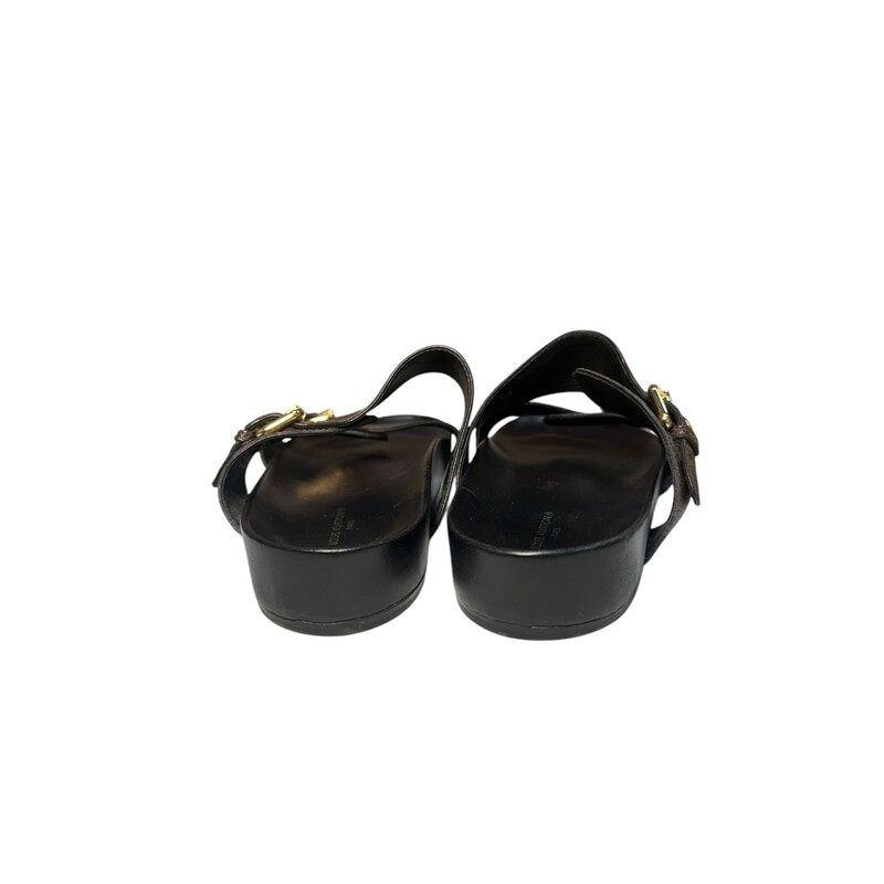 Louis Vuitton Bom Dia Monogram Buckle Sandals<br />
<br />
Size: 41<br />
<br />
Style Code: MAO232<br />
<br />
In very good condition. Minor scuff of the leather on front left shoe.<br />
<br />
Comes with original dust bag. No box.