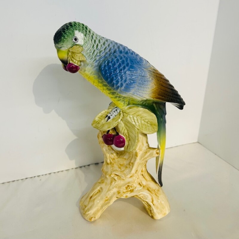 Porcelain Parrot Statue
Blue Green Purple Tan Size: 6.5 x 10.5H