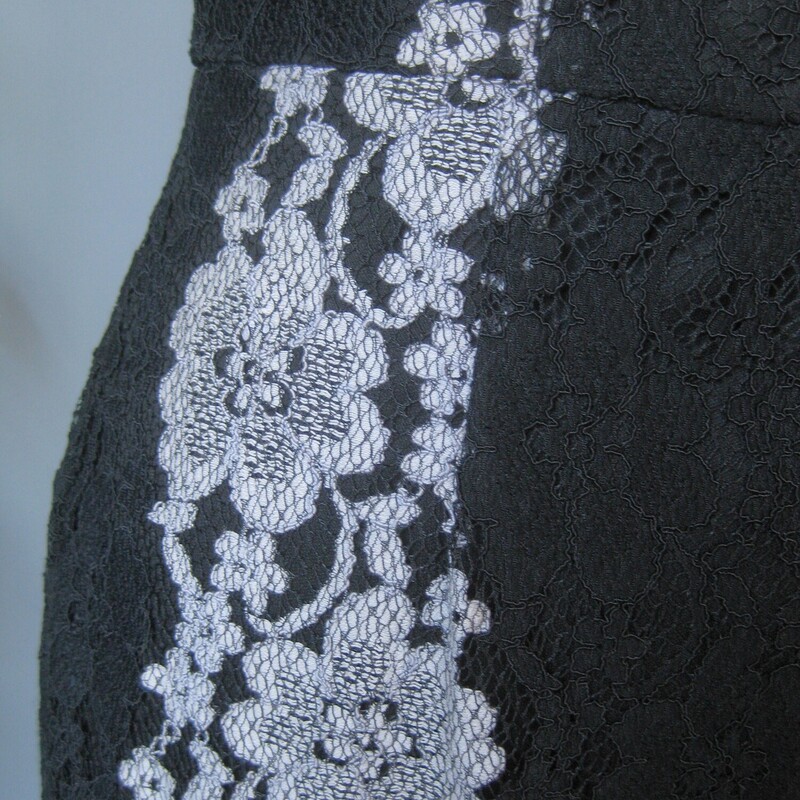 Betsey Johnson Lace Cockt, Black, Size: 6<br />
Stylish body conscious cocktail dress from  Betsey Johnson.<br />
It's made of black and gray lace, arranged in flattering vertical design lines<br />
Cap sleeves fully lined center back zipper<br />
It's marked size 6 BUT, imo opinion it would fit a modern size 4 better.<br />
Please use the flat measurements here as your ultimate guide to how it will fit your body.<br />
The fabric has little to no stretch.<br />
<br />
flat measurements:<br />
shoulder to shoulder: 15<br />
armpit to armpit: 17<br />
waist: 15<br />
hips: 19<br />
length: 40.25<br />
like new condition!<br />
thanks for looking1<br />
#81425