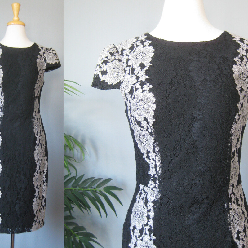 Betsey Johnson Lace Cockt, Black, Size: 6
Stylish body conscious cocktail dress from  Betsey Johnson.
It's made of black and gray lace, arranged in flattering vertical design lines
Cap sleeves fully lined center back zipper
It's marked size 6 BUT, imo opinion it would fit a modern size 4 better.
Please use the flat measurements here as your ultimate guide to how it will fit your body.
The fabric has little to no stretch.

flat measurements:
shoulder to shoulder: 15
armpit to armpit: 17
waist: 15
hips: 19
length: 40.25
like new condition!
thanks for looking1
#81425