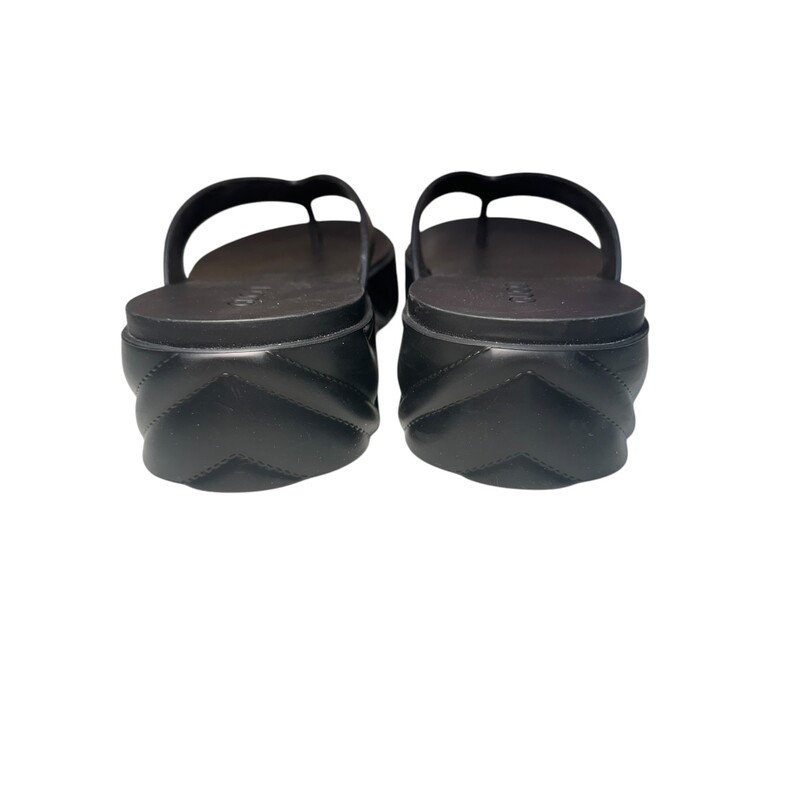 Gucci Debossed Platforms Black Flip Flops<br />
<br />
Size: 37<br />
<br />
Date Code: 746334<br />
<br />
In very good condition. Light marks to the bottom of the shoes.<br />
<br />
Does not come with the original dust bag or box.