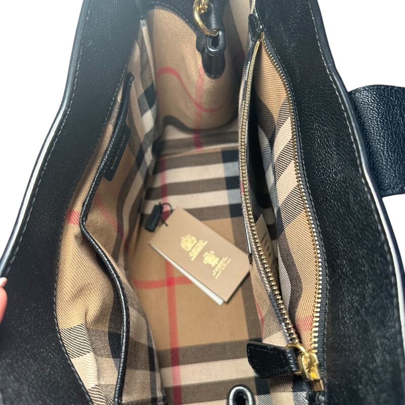 Burberry Buckle Grainy  Calfskin Leather Tote<br />
<br />
Style Code:ITSAMSRL3335CAM<br />
<br />
Dimensions:10H X 11.75 L inches<br />
<br />
In very good condition. Some  scratches on hardware.<br />
<br />
Comes with original dust bag. No box.