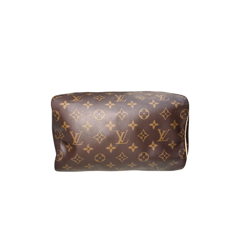 Louis Vuitton Speedy 25 Monogram<br />
<br />
Date Code: Mircochipped comes with entrupy certificate.<br />
<br />
Dimensions:<br />
Base length: 10 in<br />
Height: 7.5 in<br />
Width: 5.75 in<br />
Drop: 3.5 in<br />
<br />
In excellent condition. Light patina to the handles.<br />
<br />
Comes with dust bag, box, lock, and keys.