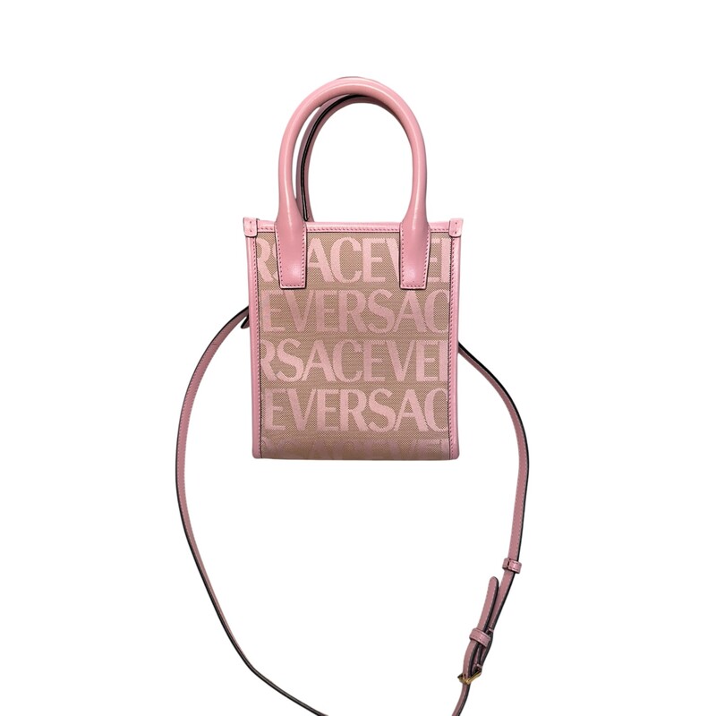 Versace All Over Tote Mini Pink<br />
<br />
Dimensions:<br />
Width:6.7 in<br />
Height:7.5 in<br />
Depth:3.1 in<br />
<br />
In good condition. Small mark by interior pocket.<br />
<br />
Does not come with original dust bag or box.