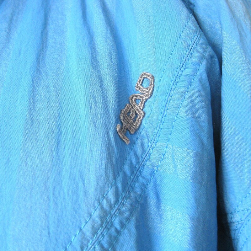 Simple vintage ski jacket in a great color by<br />
HEAD<br />
<br />
early 90s<br />
elasticized cuffs and waistband<br />
side with zippers<br />
made in Germany<br />
<br />
Marked size 40, should fit a modern size medium, it fits me well.  I am about a size 10 5'5<br />
flat measurements:<br />
armpit to armpit: 27<br />
length: 26<br />
waist: 22<br />
underarm sleeve length: 18.5<br />
CONDITION: great condition but there are a few marks and brown area, mostly under the snap ped front placket<br />
<br />
thanks for looking!<br />
#80998