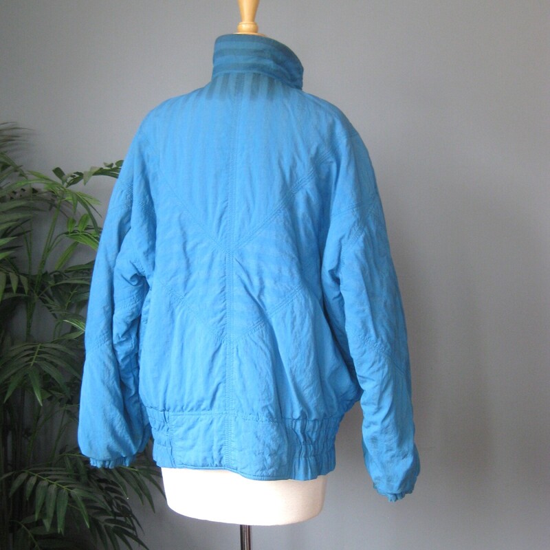 Simple vintage ski jacket in a great color by<br />
HEAD<br />
<br />
early 90s<br />
elasticized cuffs and waistband<br />
side with zippers<br />
made in Germany<br />
<br />
Marked size 40, should fit a modern size medium, it fits me well.  I am about a size 10 5'5<br />
flat measurements:<br />
armpit to armpit: 27<br />
length: 26<br />
waist: 22<br />
underarm sleeve length: 18.5<br />
CONDITION: great condition but there are a few marks and brown area, mostly under the snap ped front placket<br />
<br />
thanks for looking!<br />
#80998