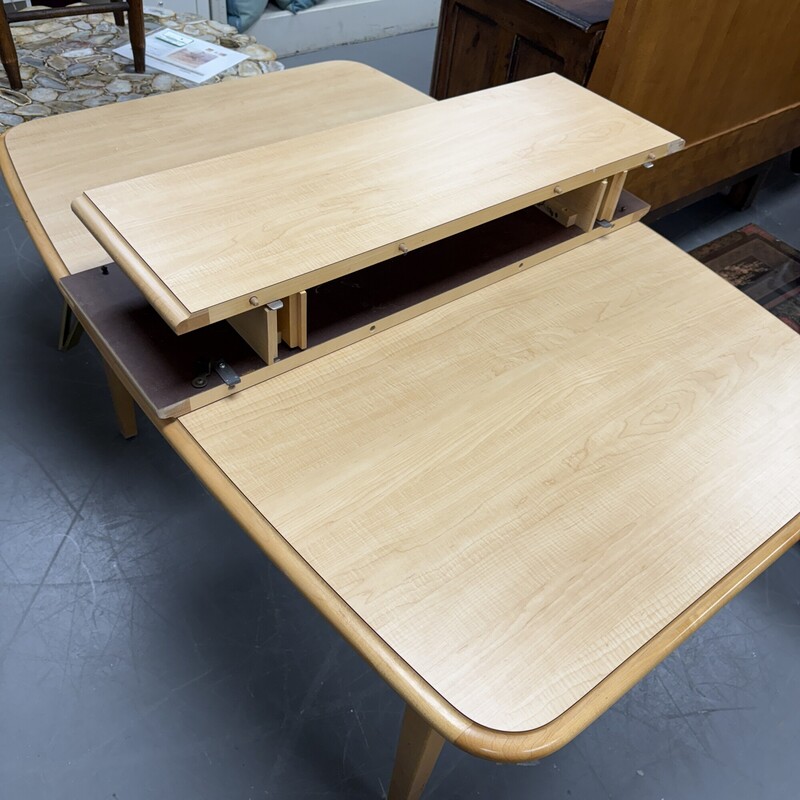 Mid Century Modern Style Maple Dining Table (no chairs included)<br />
Table Size: 57x37<br />
Includes two 12in leaves