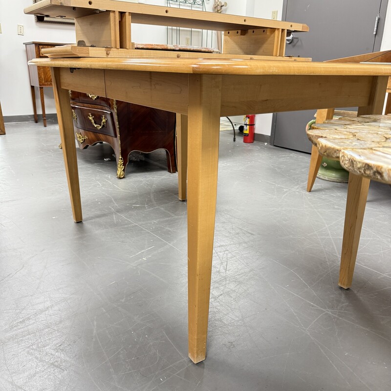 Mid Century Modern Style Maple Dining Table (no chairs included)<br />
Table Size: 57x37<br />
Includes two 12in leaves