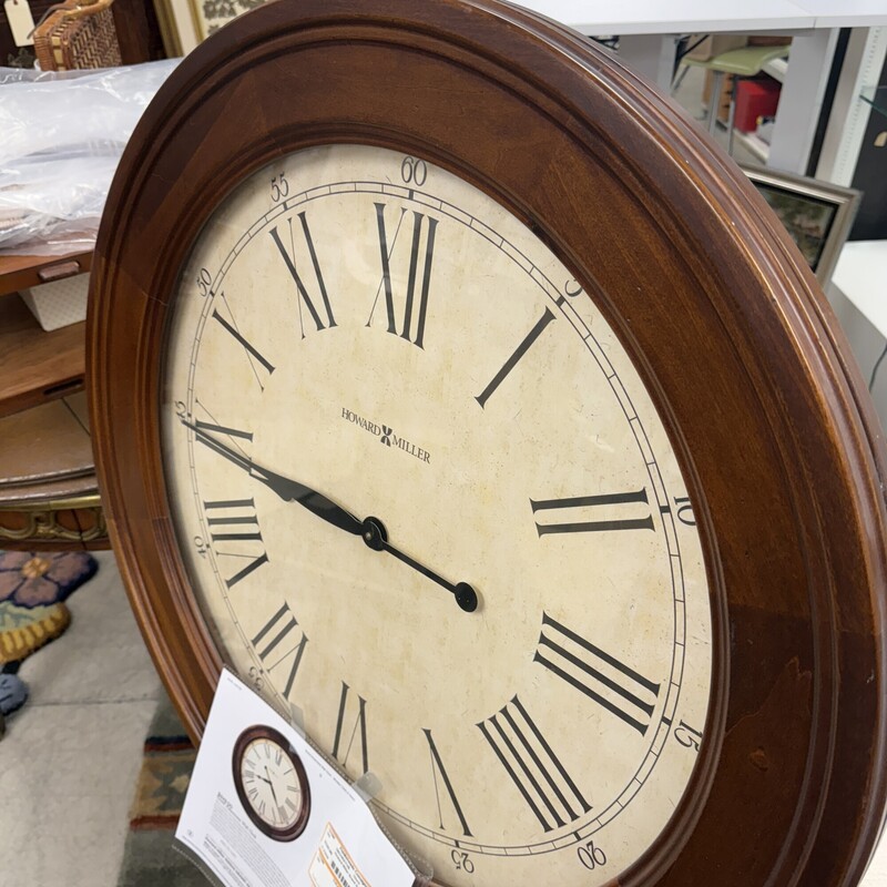 Howard Miller Grand American Wood Clock, Retails for $950!<br />
Size: 30in Diameter