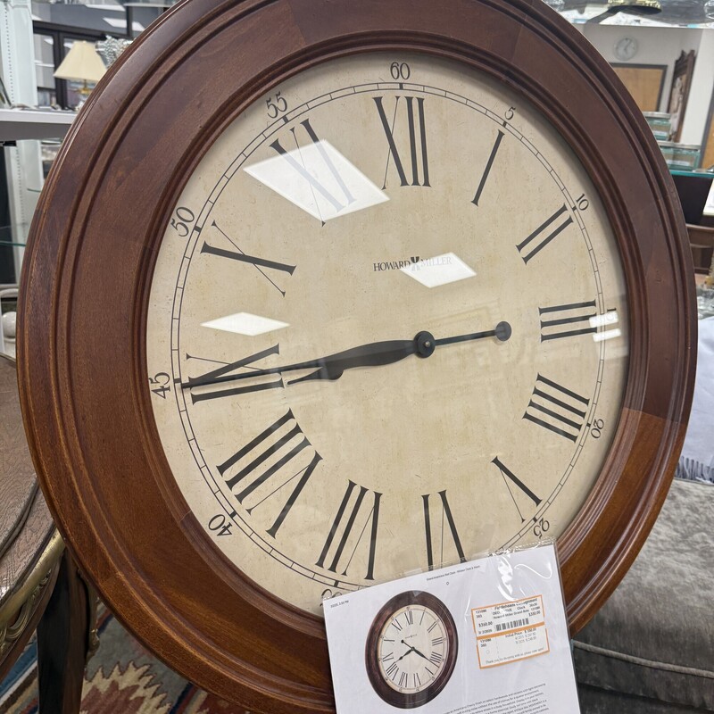 Howard Miller Grand American Wood Clock, Retails for $950!<br />
Size: 30in Diameter