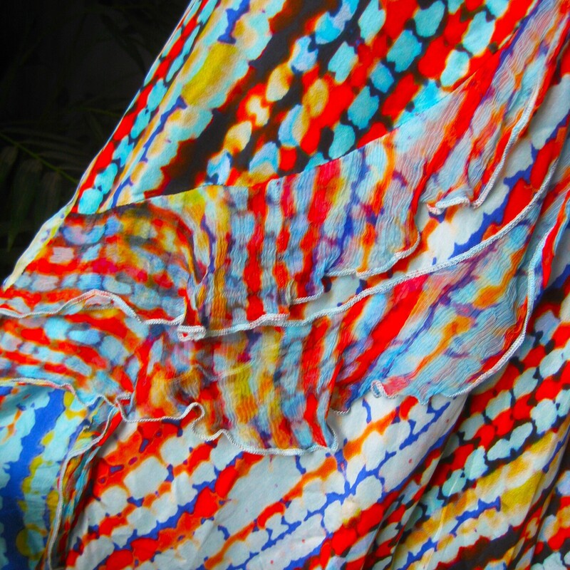 Pretty, feminine, easy to wear and easy to pack 100% silk dress from Sundance.
blue and orange abstract print
squared off v neckline
center back zipper
full skirt
 the silk is gauzy, very lightweight, the dress is lined in cotton.
fluttery ruffles on the skirt
Size 6
flat measurements: no stretch
ampit to armpit: 17.5
waist: 15.5
hip: up to 24
length: 42

excellent condition, no flaws.
thanks for looking!
#83177