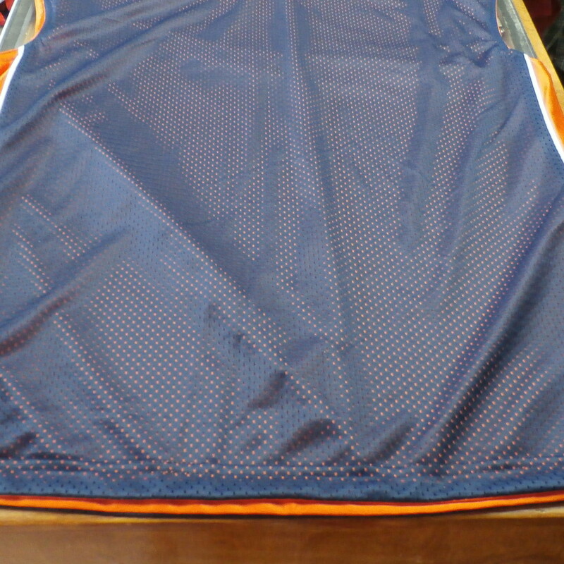 Starter Men's Sleeveless Reversible Basketball Jersey Size Large #15244 
Rating:   (see below) 3 - Good condition 
Team: n/a
Player: n/a
Brand: Starter
Size: Large - Men's(Measured Flat: Across Chest 23\"; Length 30\") 
Measured Flat: under arm to under arm; Top of shoulder to the hem
Color: Multi-Colored
Style: Reversible Basketball Jersey
Material: 100 Polyester
Condition: - Good Condition - wrinkled; material looks and feels good; snags/runs front and back; minor fuzz; light black mark near the tag; fuzz; no rips or holes(See Photos for condition and description)
Shipping: $4.76
Item #: 15244