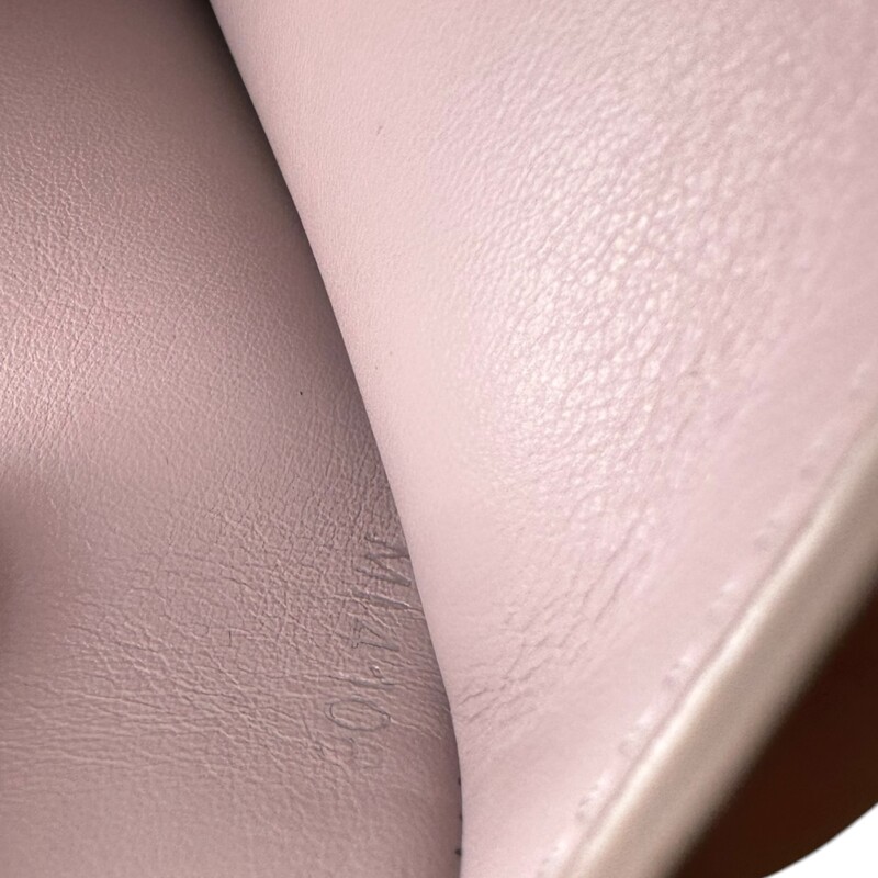 Louis Vuitton Capucines Rosa Embellished Wallet<br />
<br />
Date Code:MI4108<br />
<br />
Dimensions: 5L x 4H inches<br />
<br />
In good condition. Some corner wear and scuffs on the leather. Some interior marks.<br />
<br />
Does not come with original dust bag or box.