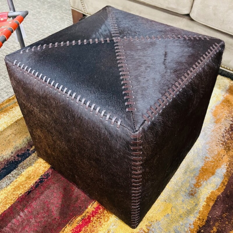 Jamie Young Cowhide Ottoman
Dark Brown
Size: 16 x 16 x 16H
Beautiful leather, natural hide and white hide finishes create this collection. These pieces are great for rustic, modern, lodge, urban or country environments. This assortment of art brings great natural textures inside the home.
Imported.. Retail $1375 each
Matching Ottoman Sold Separately