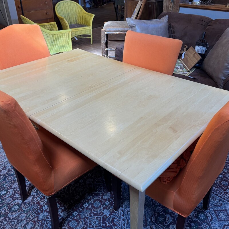 Farmhouse Table & Chairs<br />
Chairs (4) are Orange Upholster and Have Extra Orange Covers<br />
Table has a Leaf that is 21 Inches Wide<br />
Table is 62 Inches Long, 40 Inches Wide, 31 Inches High<br />
Chairs are 22 Inches Wide, 19 Inches Deep, 38 Inches High