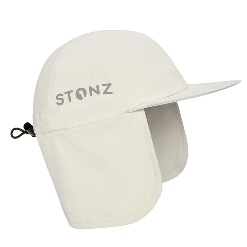 STONZ FLAP CAP, Ivory, Size: 1-3Y
Keep your little explorer protected and burn-free with our baby Flap Cap. Made with non-toxic, tightly-woven fabric, so you don’t need to use sunscreen to keep them protected: just put on their hat and they’re ready to go! Their skin and the environment will thank you.
Non-toxic UV protection: No need to use harsh sunscreens. The tightly-woven fabric provides complete UPF 50 protection for your child.

Perfect fit that stays on: Thanks to the adjustable toggle closure, this versatile flap-hat fits any child. And stays on all day long!

Soft & comfortable: With a super-soft fabric and breathable mesh lining, your little one will stay fresh and cool regardless of the weather.

Machine washable: Got a little ice cream on it? No worries, wash inside out in cold water, on delicate cycle & hang to dry or tumble dry without heat.
