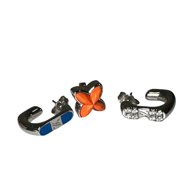 Louis Vuitton 3 Pc Beads<br />
<br />
This set of three LV Beads Earrings matches the audacious spirit of this summer’s surf-inspired looks. The three unique pieces allow multiple styling opportunities to bring a cool twist to a masculine ensemble. Crafted from palladium-finished metal, these jewels are richly detailed with vibrant enamel, LV signatures, a Monogram Flower silhouette and zircon crystals.<br />
<br />
Brass & Enamel & Zircons<br />
Multicolore<br />
Silver Color Hardware<br />
Made in Italy<br />
<br />
Code: M01859 LE1214<br />
<br />
Condition: Excellent, Like New<br />
<br />
Comes with original box and dustbag