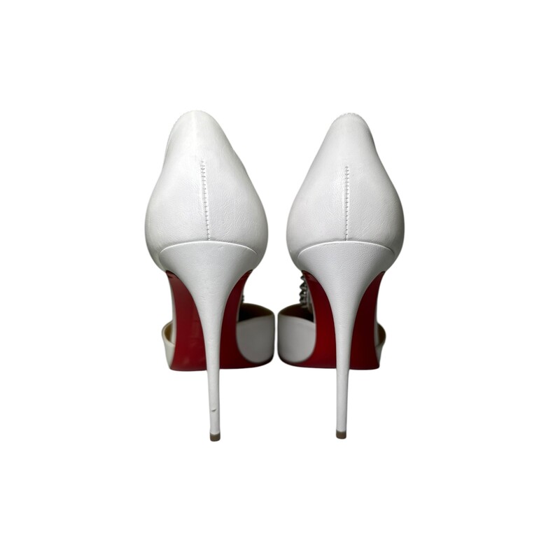 Christian Louboutin Criss Cross Spike Heels<br />
<br />
 Size: 39<br />
<br />
Heel Height: 4.5<br />
<br />
Does not come with original dust bag or box.<br />
<br />
In very condition: some light surface straches.