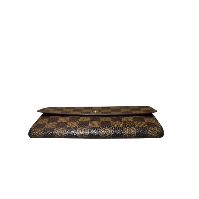Louis Vuitton Sarah Damier Ebene Wallet<br />
<br />
Date Code: TH1907<br />
<br />
Dimensions:<br />
Base length: 7.5 in<br />
Height: 4.25 in<br />
Width: 1 in<br />
<br />
In good condition. Light wear to the interior pocket and inside. Some corner wear.<br />
<br />
Does not come with the original dust bag or box.