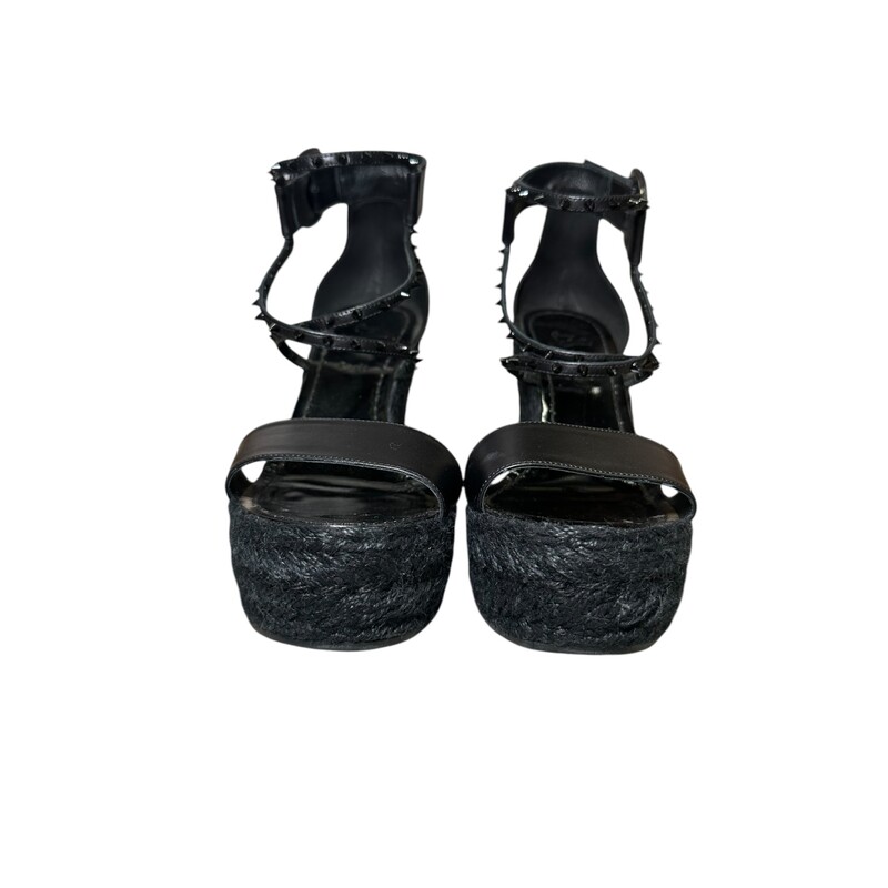 Black Christian Louboutin Chocazeppa  Wedges<br />
<br />
Size 39<br />
<br />
Spikes 120 Espadrilles<br />
<br />
Black Leather<br />
Studded Accents, Jute & Rubber Trim<br />
Multistrap & Buckle Closure at Ankles<br />
<br />
In good condition. Some wear on bottoms and on toe in soles.<br />
<br />
Comes with original dust bags and box.