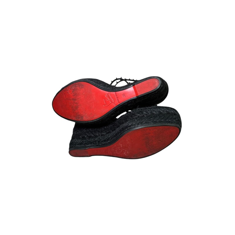 Black Christian Louboutin Chocazeppa  Wedges<br />
<br />
Size 39<br />
<br />
Spikes 120 Espadrilles<br />
<br />
Black Leather<br />
Studded Accents, Jute & Rubber Trim<br />
Multistrap & Buckle Closure at Ankles<br />
<br />
In good condition. Some wear on bottoms and on toe in soles.<br />
<br />
Comes with original dust bags and box.