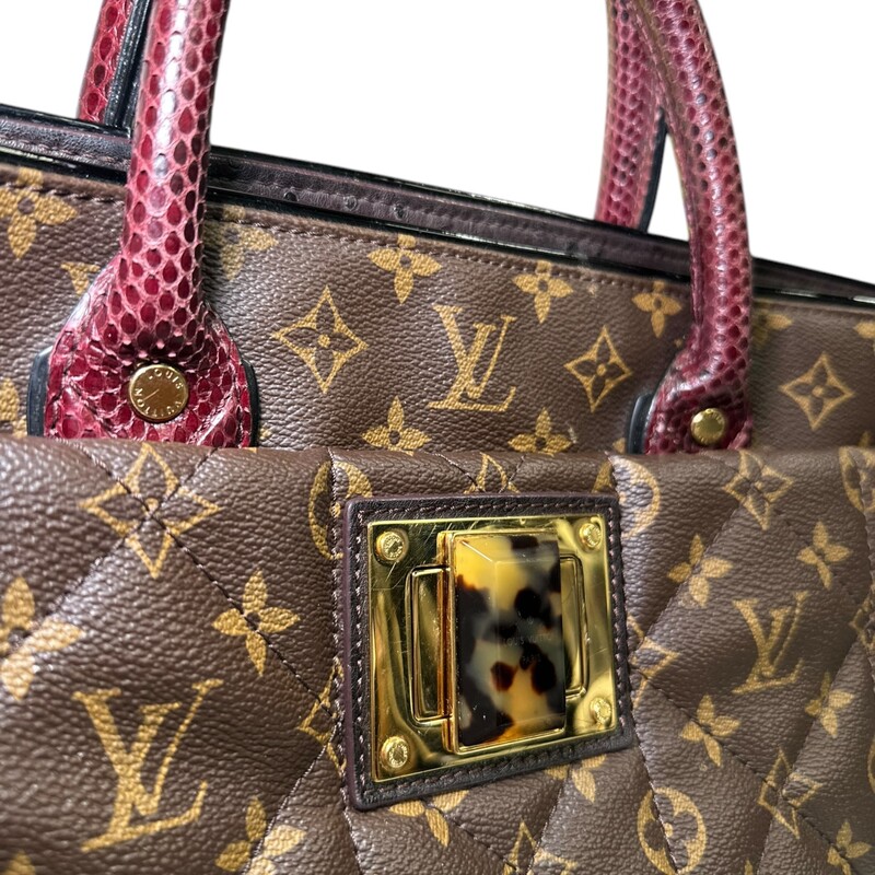 Louis Vuitton Etoile Exotique Phyton Quilted Bag<br />
<br />
Date Code: RC4171<br />
<br />
Dimensions:16 L  x  13 H  inches<br />
<br />
In very good condition. No long strap included. Some minor scuffs on the hardware and some minor marks inside the interior.<br />
<br />
Does not come with original dust bag or box.