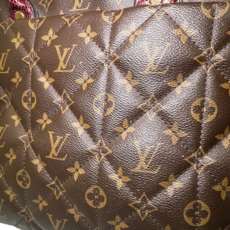 Louis Vuitton Etoile Exotique Phyton Quilted Bag<br />
<br />
Date Code: RC4171<br />
<br />
Dimensions:16 L  x  13 H  inches<br />
<br />
In very good condition. No long strap included. Some minor scuffs on the hardware and some minor marks inside the interior.<br />
<br />
Does not come with original dust bag or box.